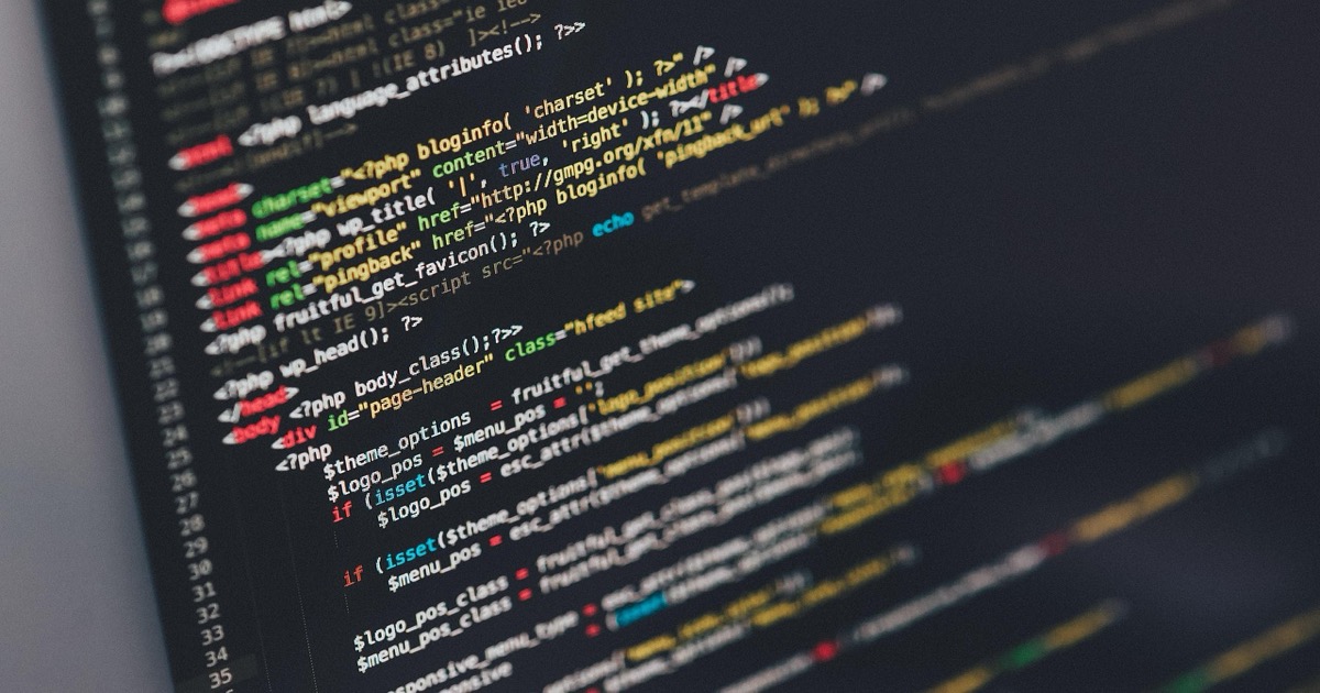 Computer code and technology infrastructure representing the AI supply chain under threat from the Iran war and Hormuz Strait closure