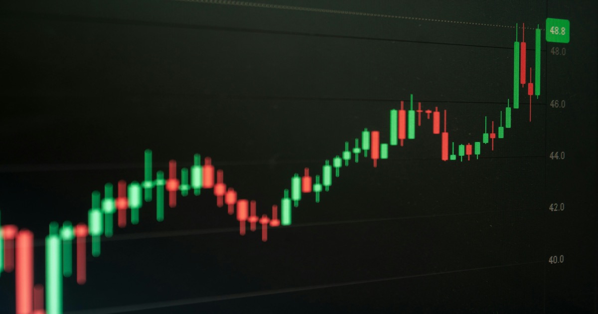 Stock market chart showing green upward growth trend indicating a strong rally day
