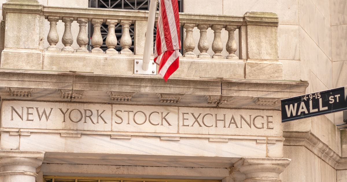 New York Stock Exchange building facade with American flag representing the market close on March 30, 2026