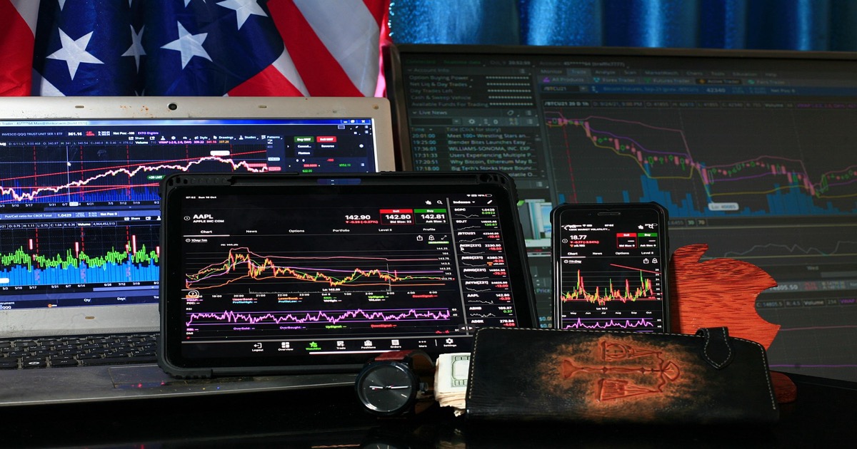 Financial market chart with rising green price lines on a trading screen