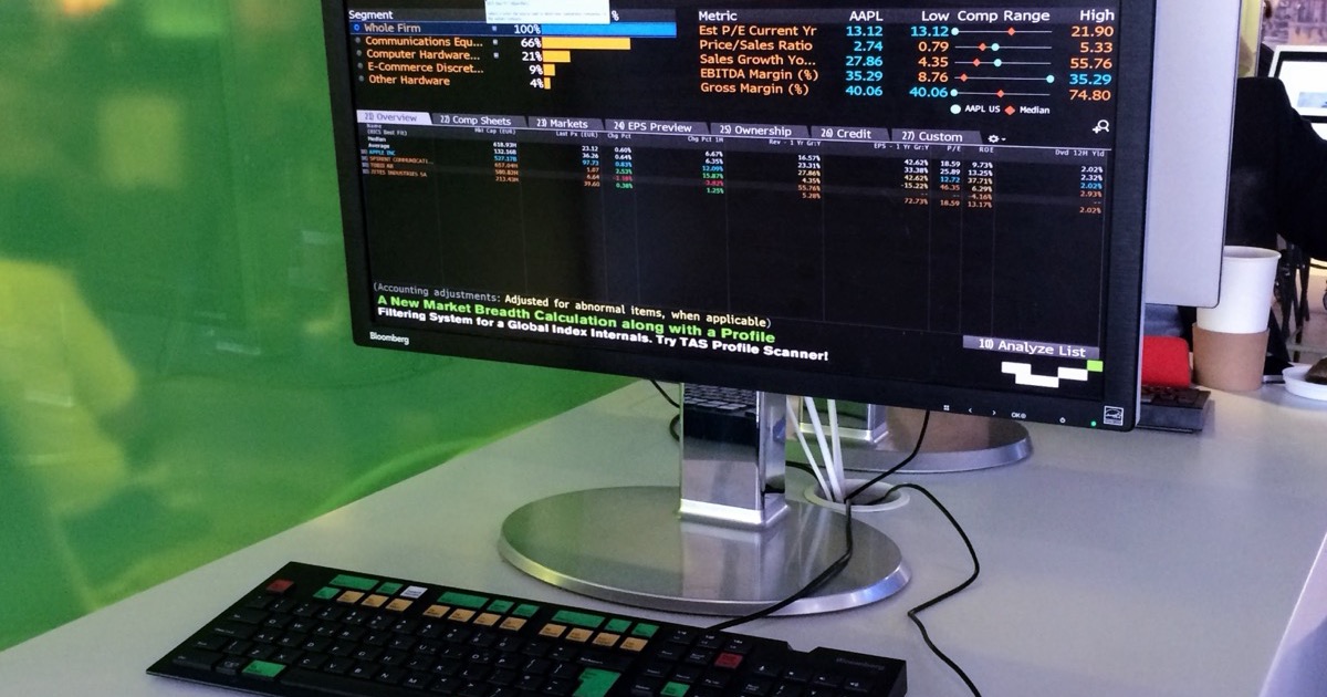 Bloomberg terminal displaying an equity relative-valuation screen with fundamental metrics — an introduction to quantamental trading