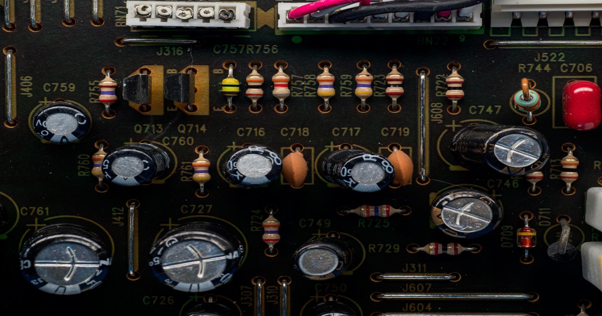 Close-up of a circuit board with electronic components symbolizing the semiconductor industry
