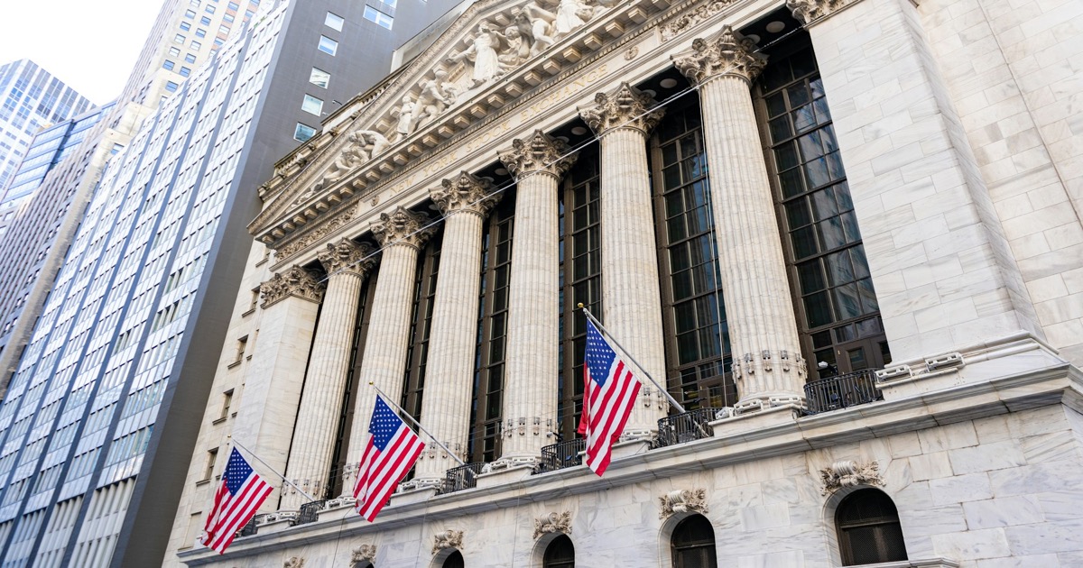 New York Stock Exchange building facade with American flags
