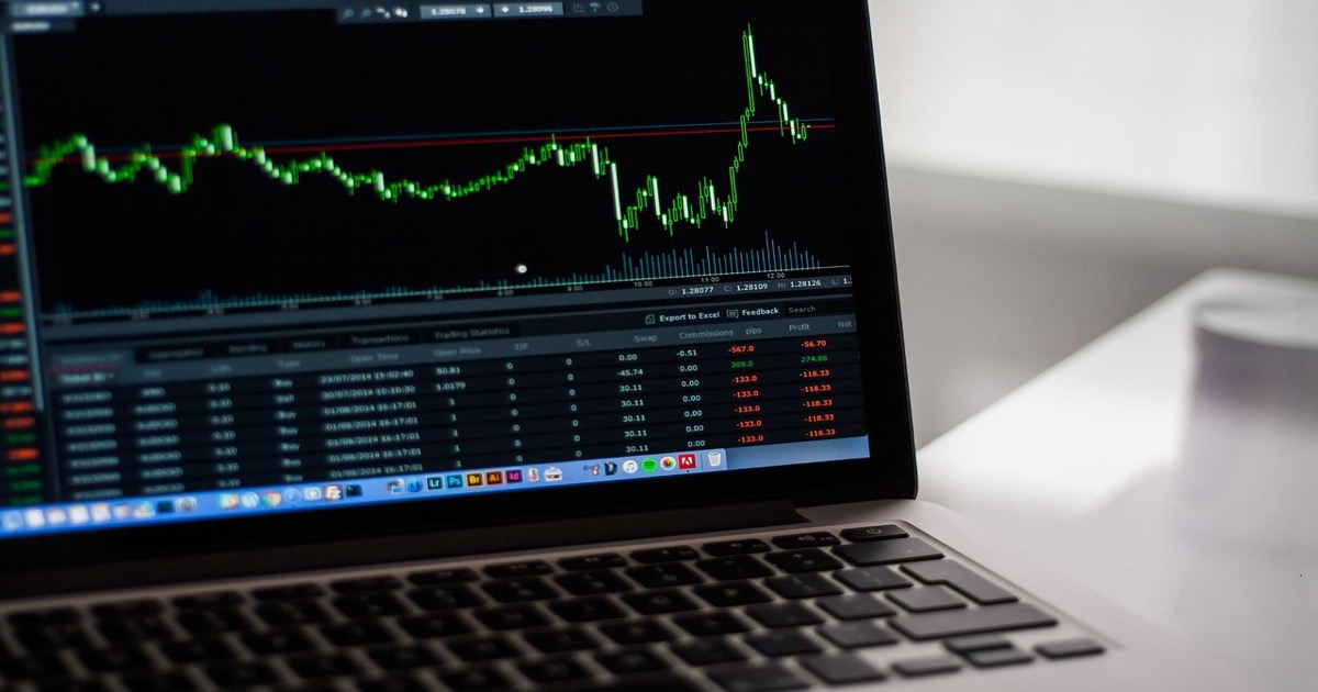 Stock market trading charts and financial data screens