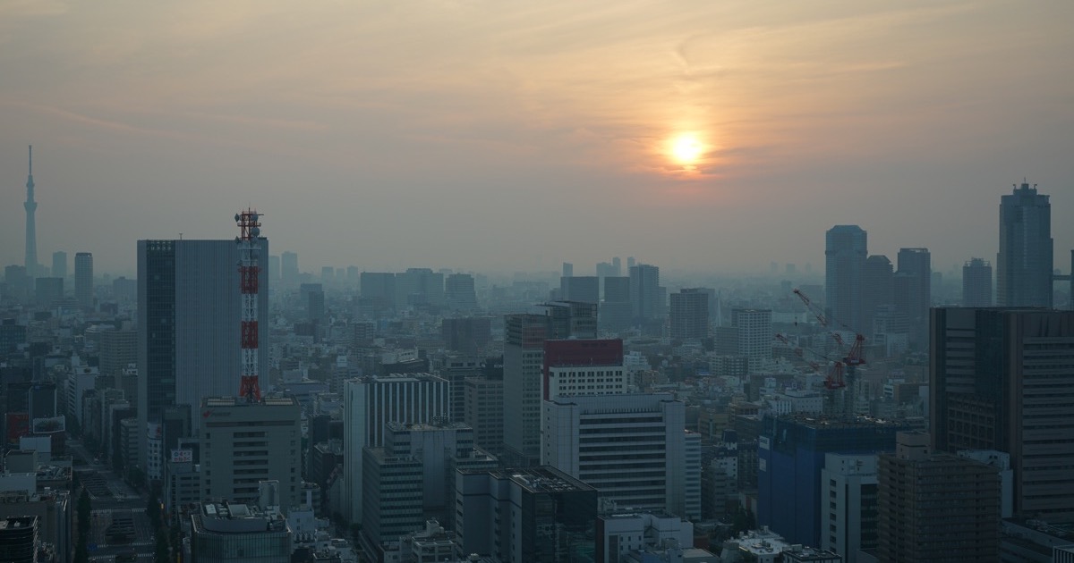 The Tokyo skyline at sunrise before global markets open on August 17, 2026.