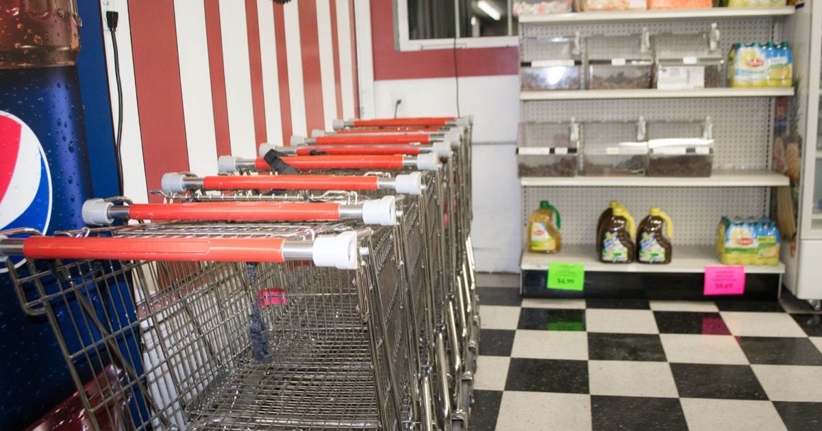 A row of shopping carts inside a grocery store before Walmart earnings on August 20, 2026.