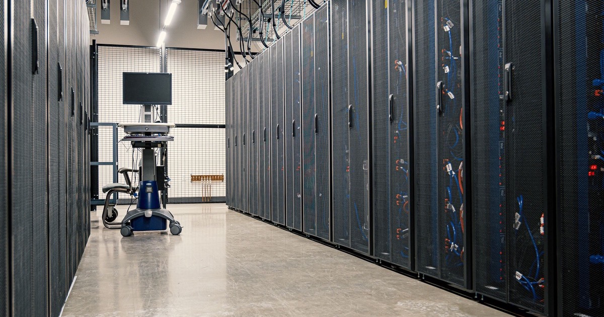 Server racks in a modern data center, representing the AI infrastructure demand behind Nvidia's August 27, 2026 earnings rally.