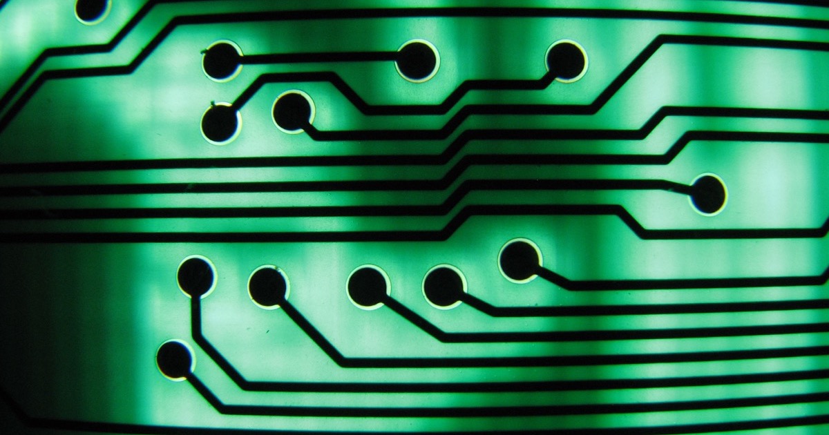 A close-up of a green printed circuit board, on the morning of August 4, 2026.