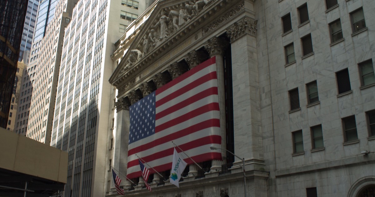 The American flag draped across the facade of the New York Stock Exchange, which is closed for Independence Day on July 3, 2026.