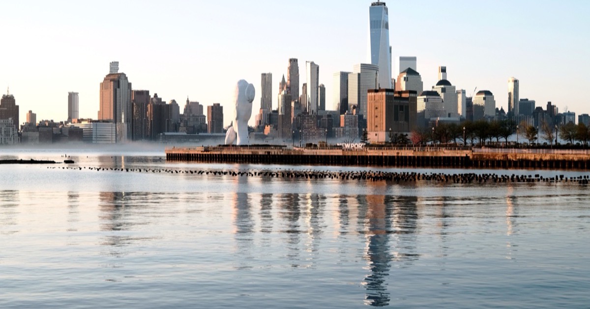 A calm Manhattan skyline at sunrise, matching the June 18, 2026 AlphaEdge morning update on rebounding futures, falling oil and the post-Fed macro test.