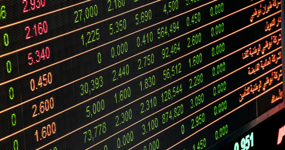 Financial market data displays showing oil price surge and trading activity during volatile morning session amid geopolitical tensions