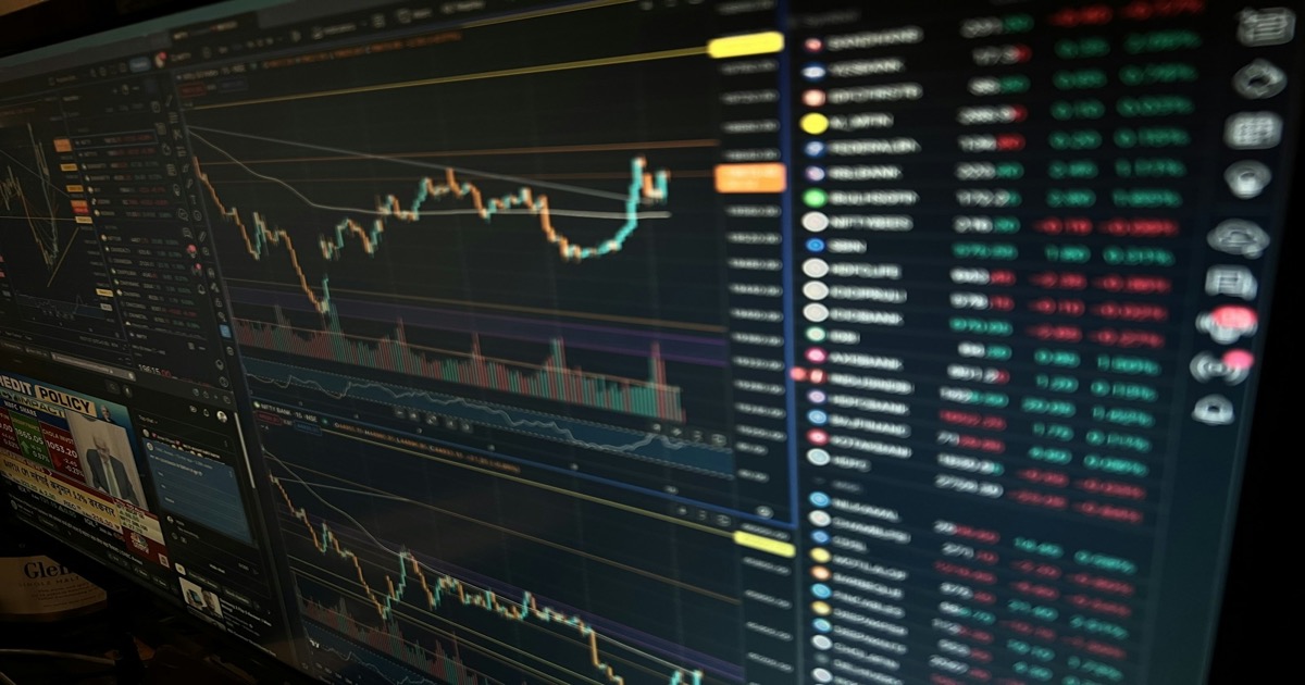 Close-up of a market data screen showing financial charts and analytics for the May 21 morning update.