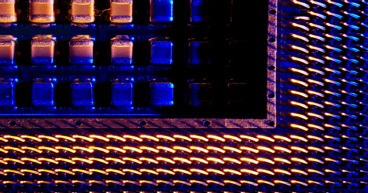 Close-up view of a computer processor chip with blue circuit board traces