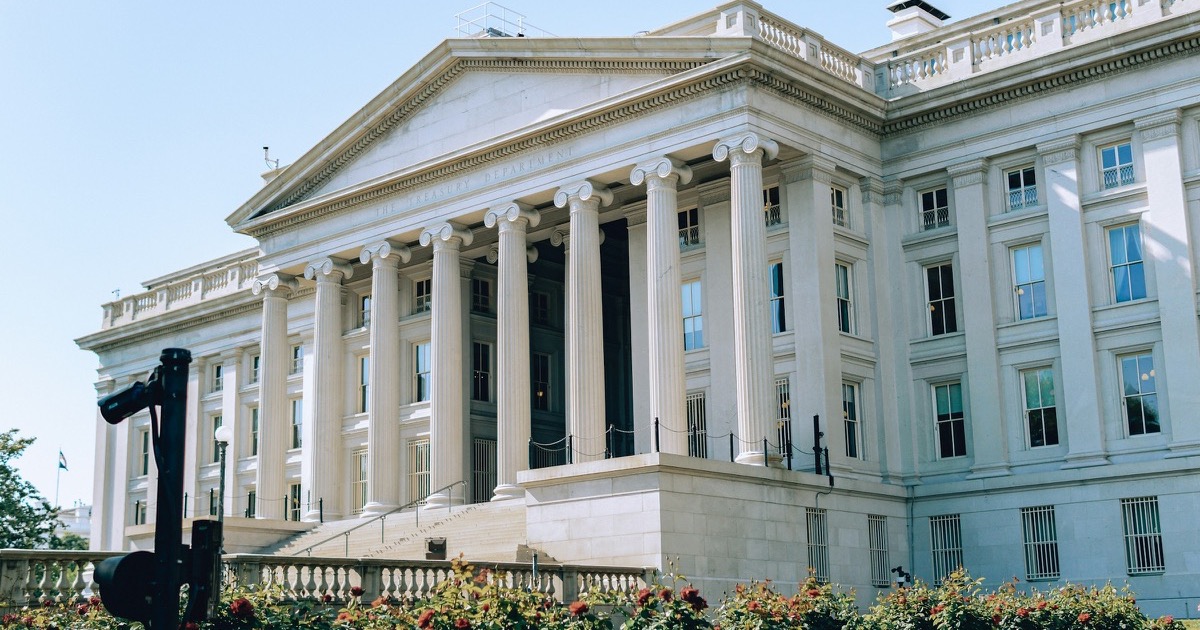The U.S. Treasury Building represents the global bond-yield test facing equities and the AI earnings trade on Wednesday.